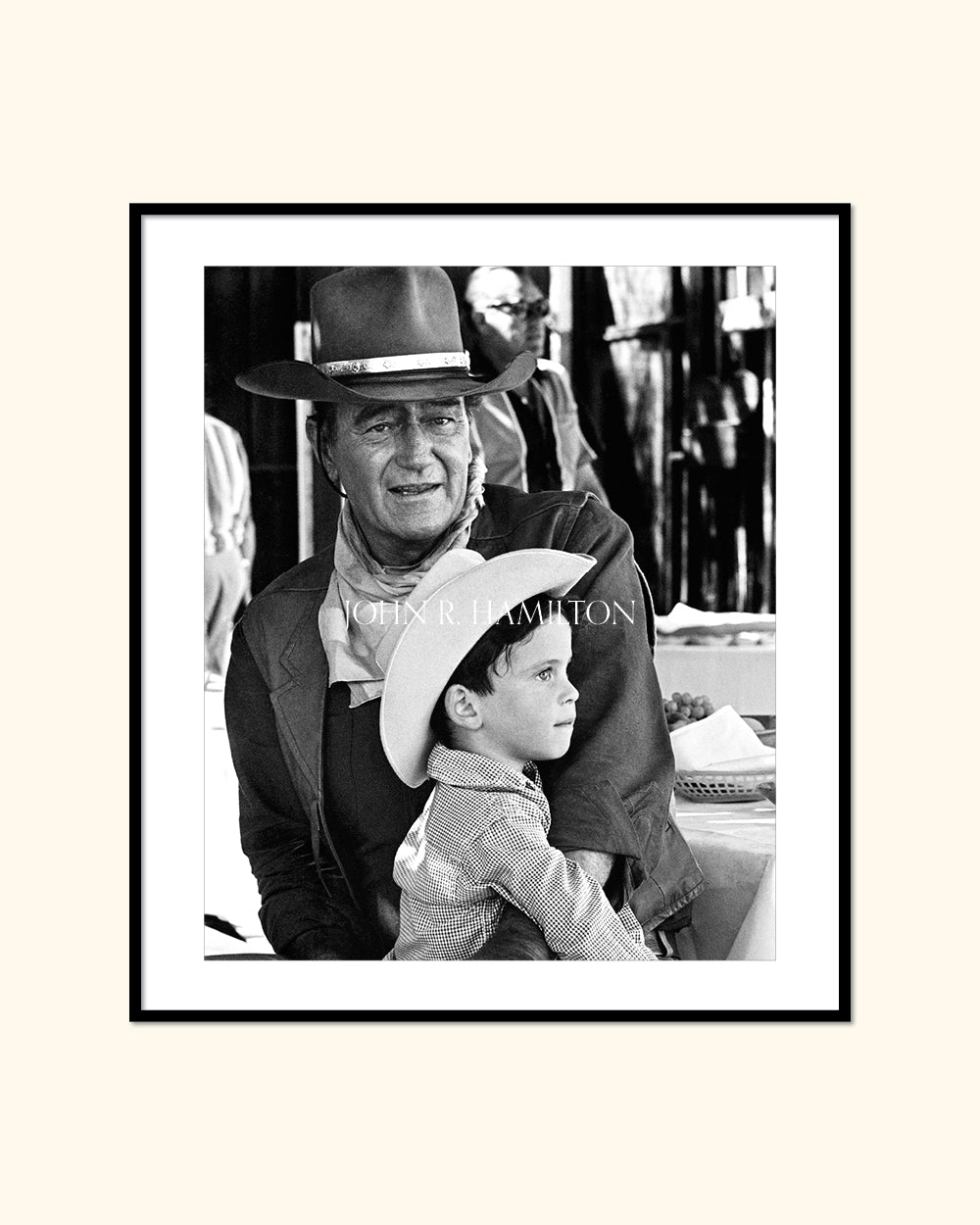 JOHN WAYNE AND SON ETHAN ON THE SET OF "EL DORADO", 1966
