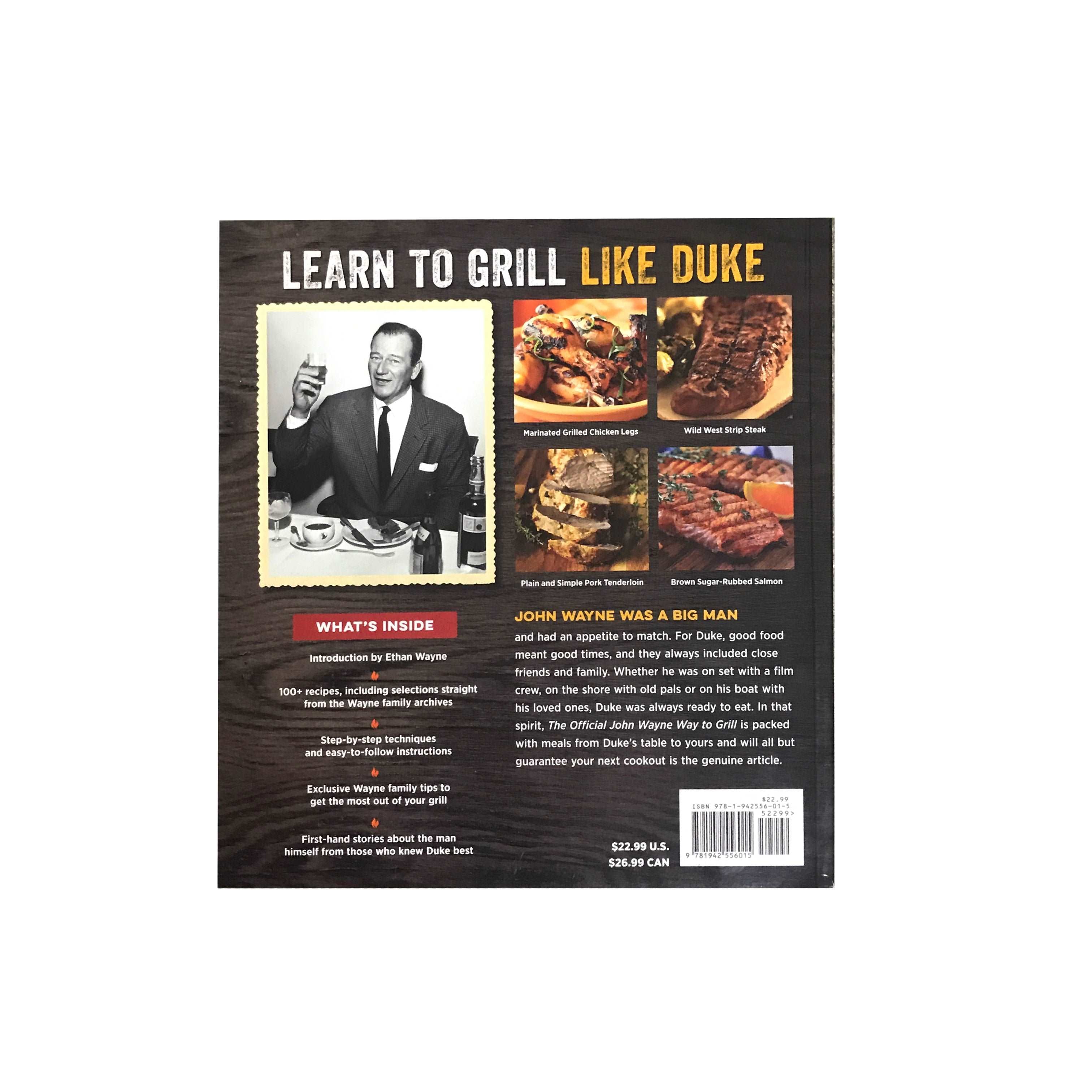 back of John Wayne way to grill cookbook with wood background and pictures of food