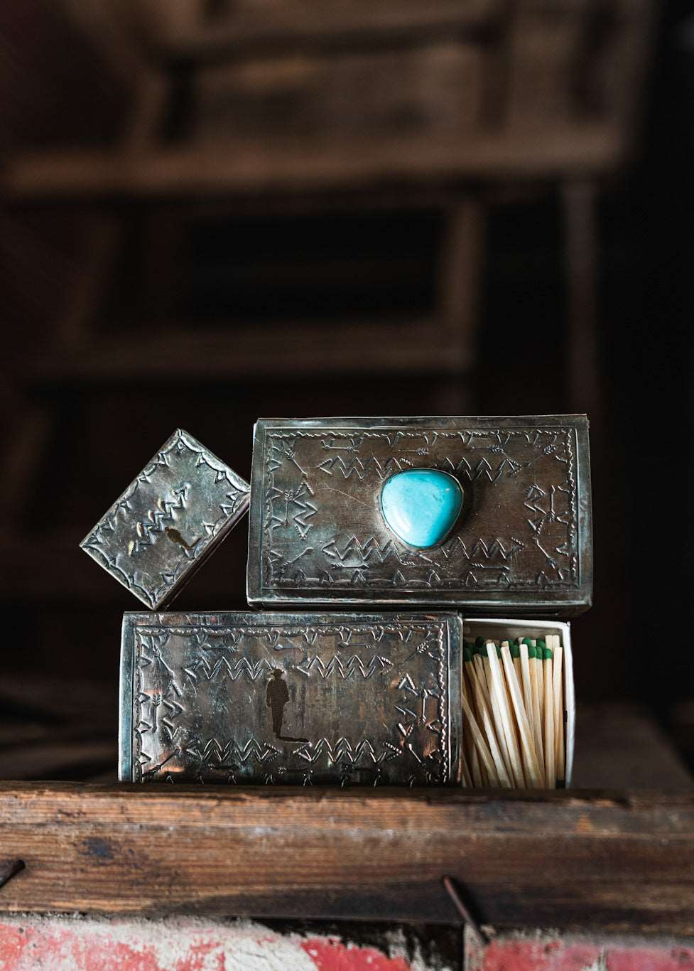 john wayne silhouette match boxes stacked on top of each other