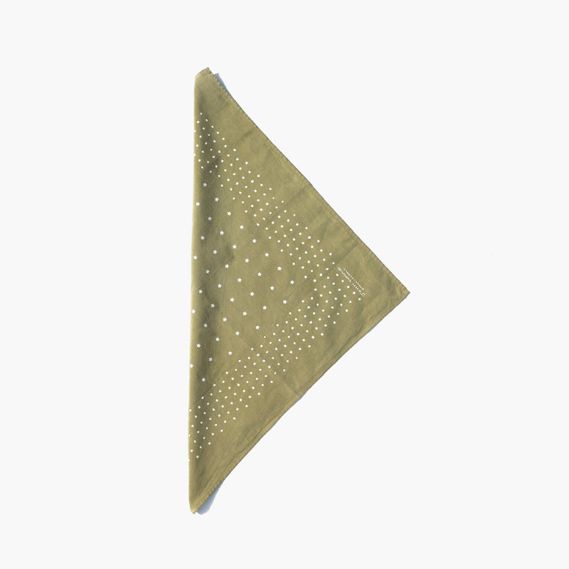 folded tan bandana with stars and dots all over it