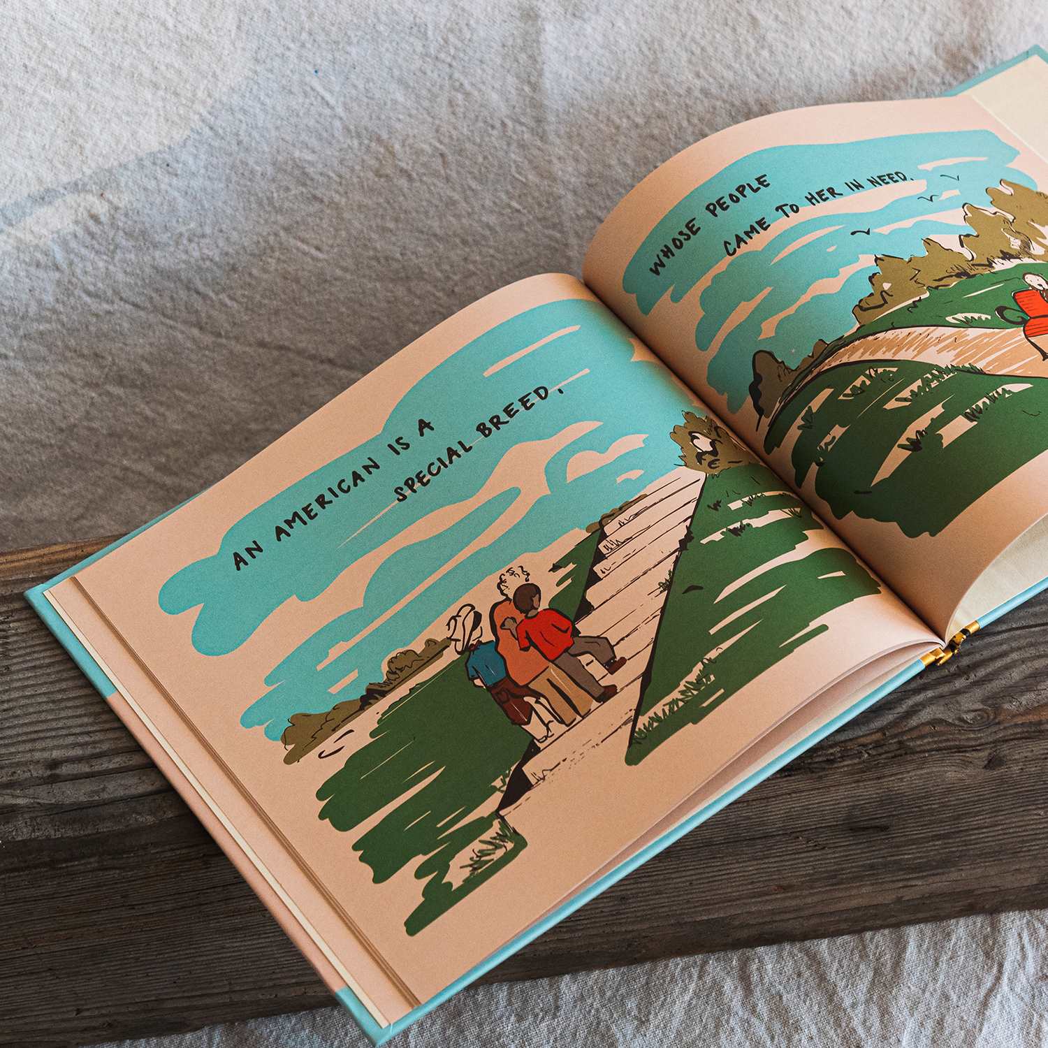 the hypen book opened to pages with people walking up stairs