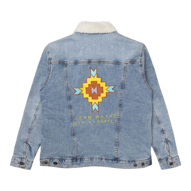 back of womens denim jacket with yellow and orange tribal design