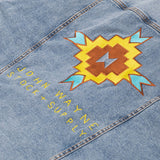 close up of yellow and orange tribal design on pocket