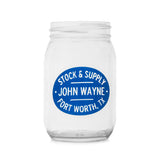 front of glass mason jar with "stock & supply John Wayne Fort Worth, TX" on it