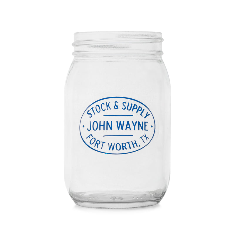 front of mason glass jar with "stock & supply John Wayne Fort Worth, TX" on it