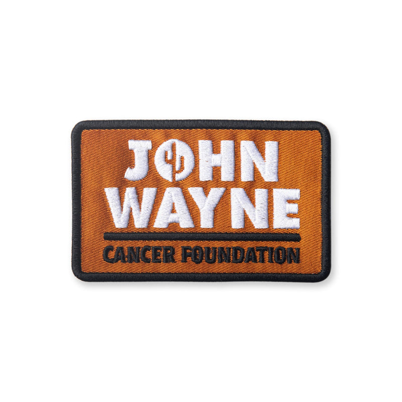 rectangular patch with "john wayne cancer foundation" on it