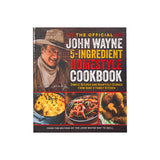 front of John Wayne 5 ingredient homestyle cook book with picture of john wayne, mac n cheese, chicken wings, and steak with bell peppers on it