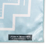 close up of john wayne stock & supply on corner of rag  
