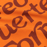 close up of  "feo fuerte y formal" on bandana 