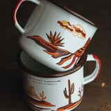 monument valley cactus scenery on two enamel mugs stacked on top of each other 