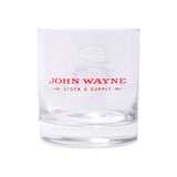 back of whiskey glass with "john wayne stock & supply" in red