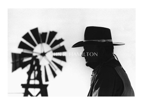 print of JOHN WAYNE WITH WINDMILL IN BACKGROUND, 1967