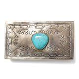 match box with turquoise stone on top