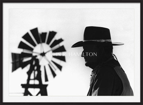 print of JOHN WAYNE WITH WINDMILL IN BACKGROUND, 1967
