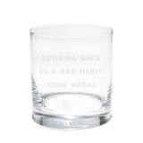 whiskey glass with "looking back is a bad habit. john wayne"