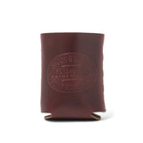 front of leather koozie with "stock & supply John Wayne Fort Worth, TX" on it