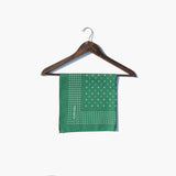 green bandana folded on hanger