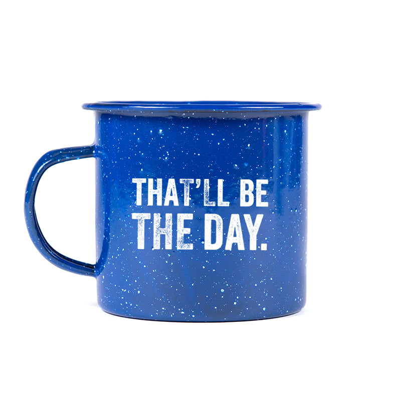 blue tin mug with "that'll be the day" 