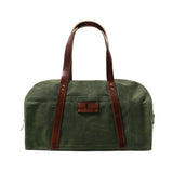 green waxed canvas duffle bag with leather handles and john wayne silhouette patch 