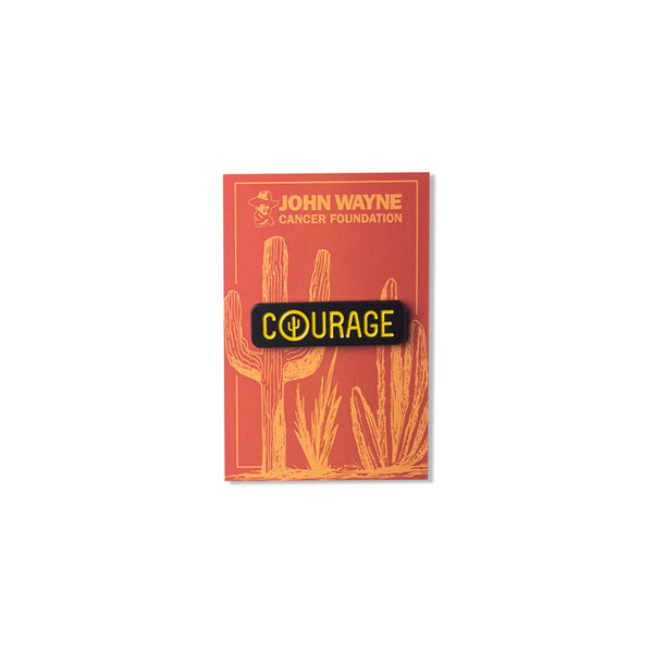 square pin with "john wayne cancer foundation courage" with cacti background
