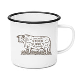 front of mug with cattle that has " john wayne stock and supply" text on it